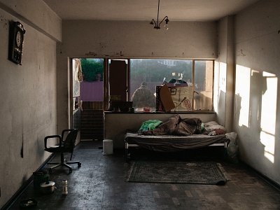 Kenny Ncube on the balcony of his flat in Sherwood Heights, Smit Street