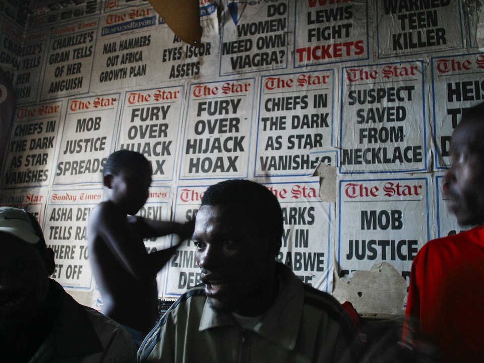 Ntokozo (right) and his brother Vusi Tshabalala at Ntokozo's place, Milton Court, Pritchard Street