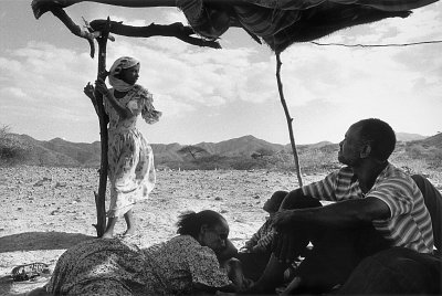 Displaced people in a shelter they have built near Keren, Eritrea, during the Eritrea/Ethiopia war, 2000