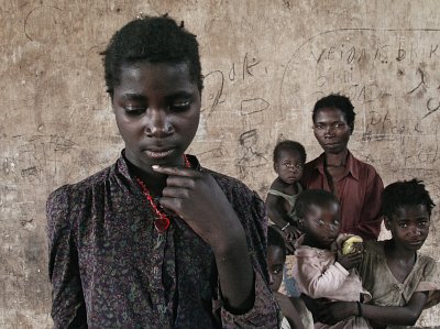 Fiorinda Ngoma, her mother Rosalia Nahamba (holding baby Filomena Lasinda), and her sister Rosali Sindali, holding baby Guerra
